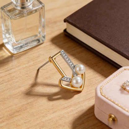 🔺 “Architectural Akoya Triad” – Geometric Artistry | Interlocking Gold & Silver-Tone V-Shapes × Channel-Set Shimmer × Two Matched Pearl Spire 🏛️