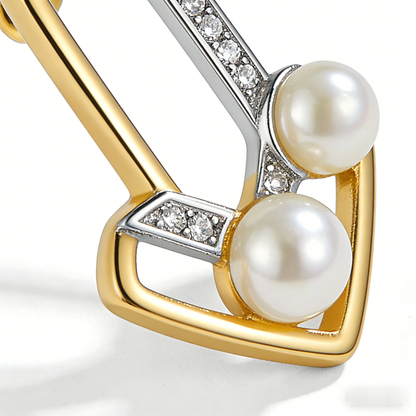 🔺 “Architectural Akoya Triad” – Geometric Artistry | Interlocking Gold & Silver-Tone V-Shapes × Channel-Set Shimmer × Two Matched Pearl Spire 🏛️