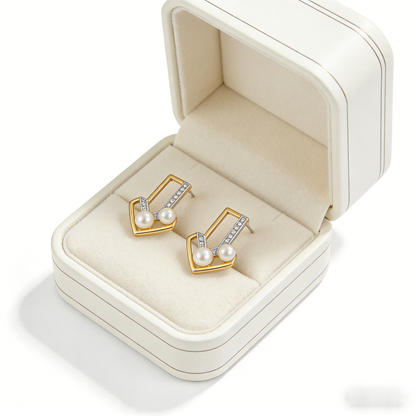 🔺 “Architectural Akoya Triad” – Geometric Artistry | Interlocking Gold & Silver-Tone V-Shapes × Channel-Set Shimmer × Two Matched Pearl Spire 🏛️